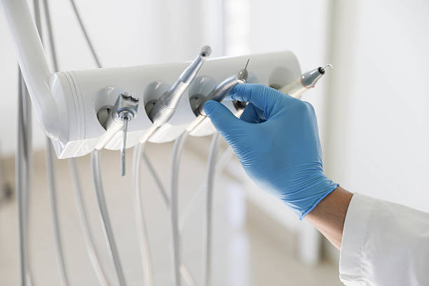 Professional Tooth Extraction technician working in Leland, NC